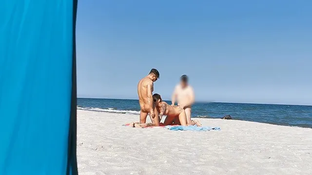 Sharing my girl with a stranger on the public beach