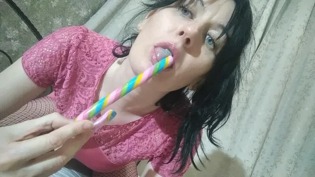 GinnaGg takes a Lollipop and shoves it deep in her hairy pussy